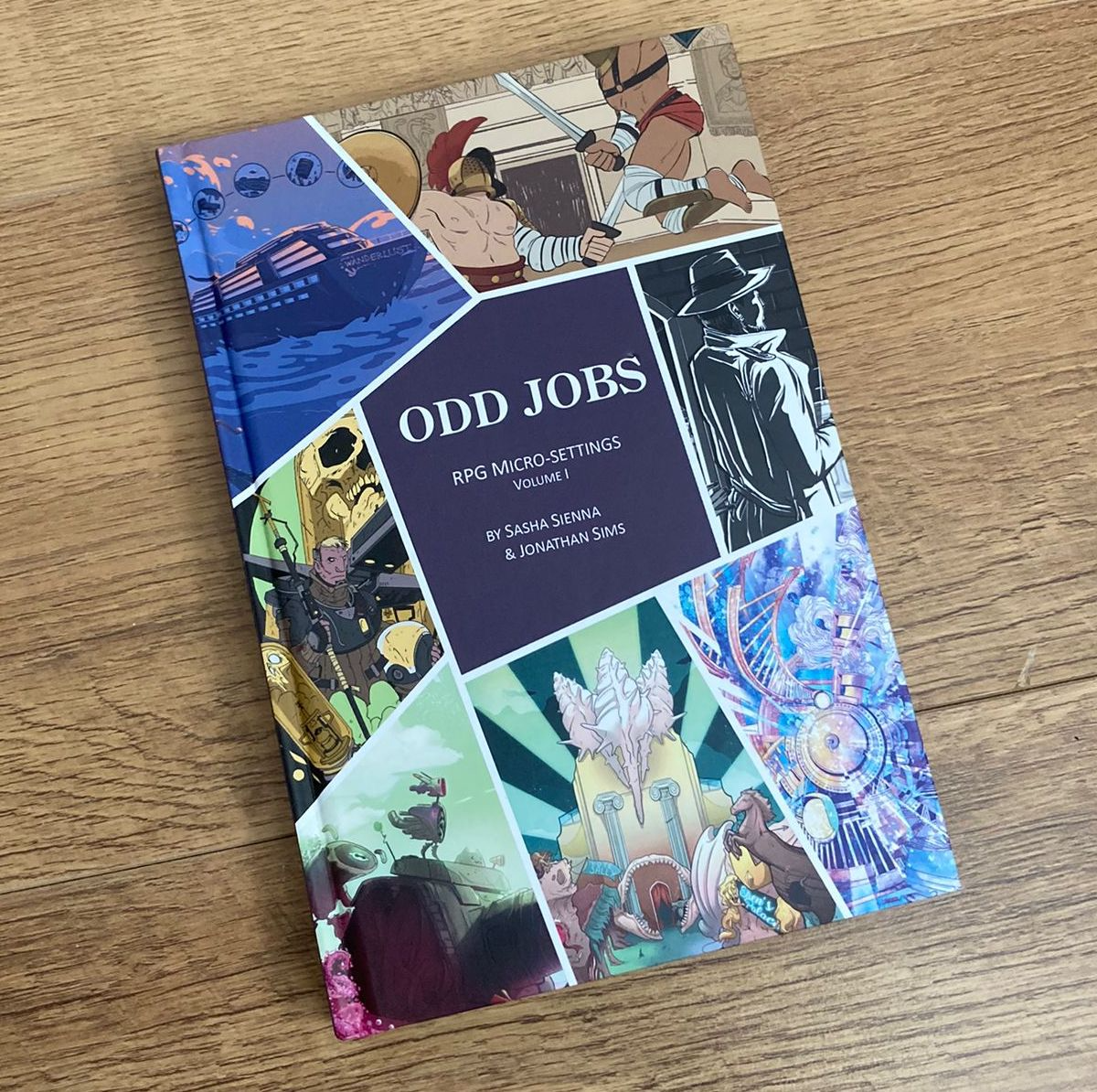 picture of the Odd Jobs book on a wooden floor