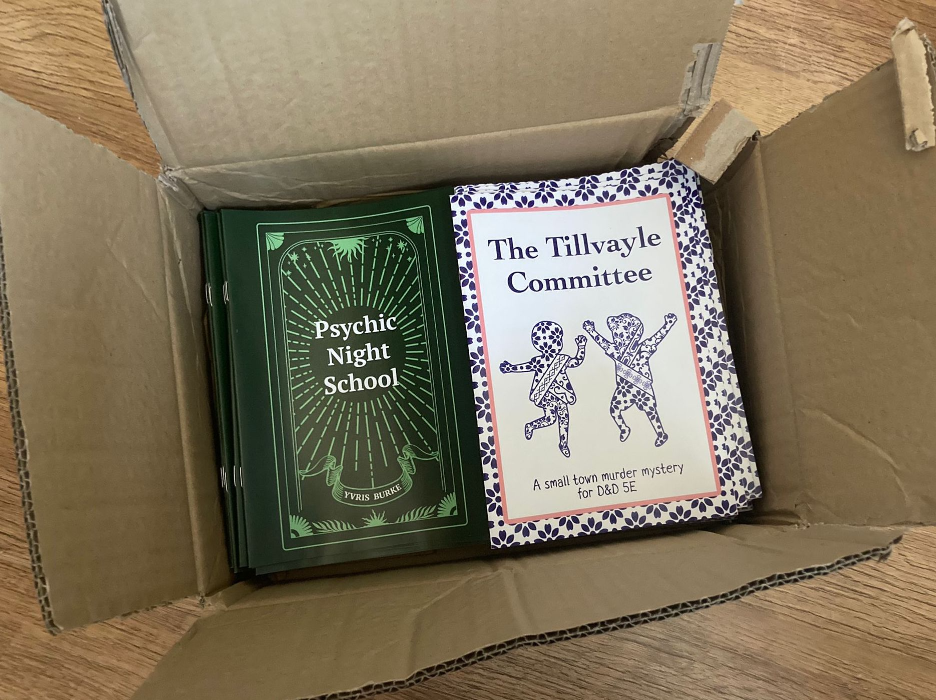 print copies of Psychic Night School and The Tillvayle Committee in a box